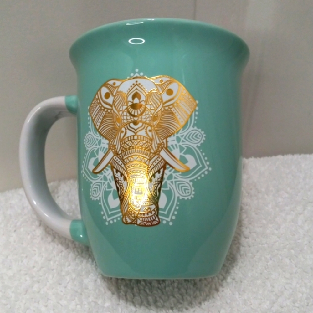 Elephant Gold Coffee Cup TMD Holdings